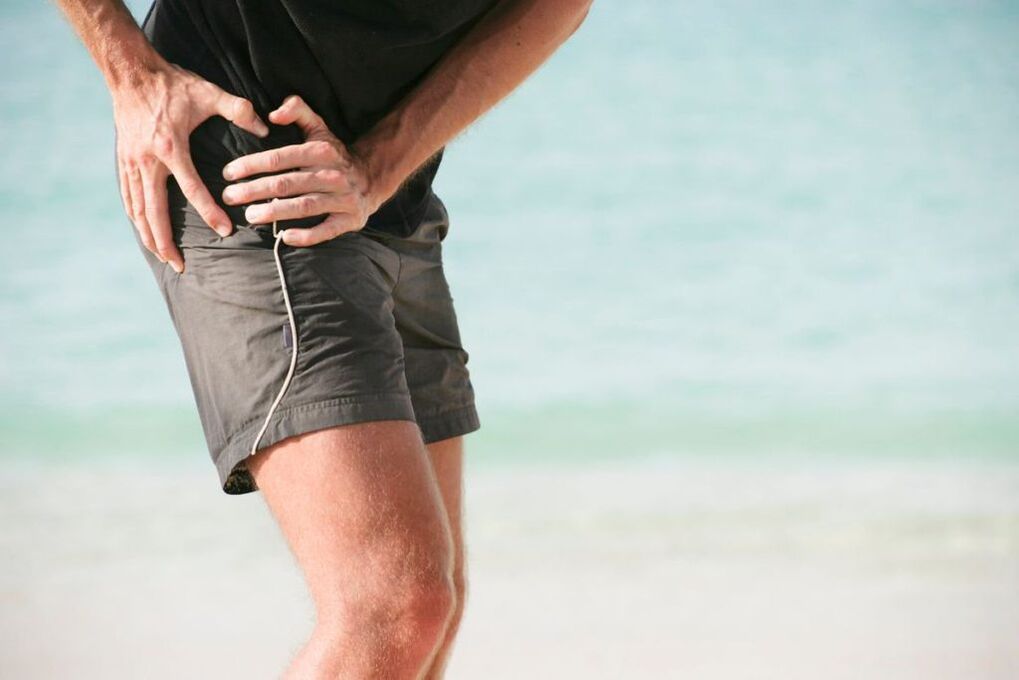pain when walking in the hip area - symptoms of arthrosis of the hip joint